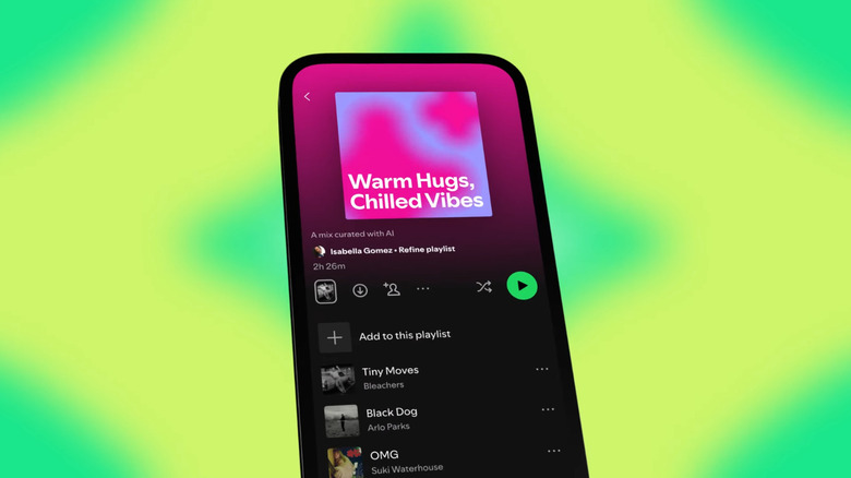 Phone showing a Spotify playlist made by the AI Playlist tool