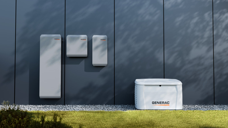 Generac standby generator next to other Generac equipment