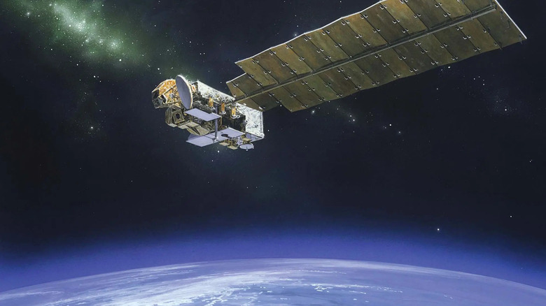 A render of the NASA Aura satellite in Earth's orbit