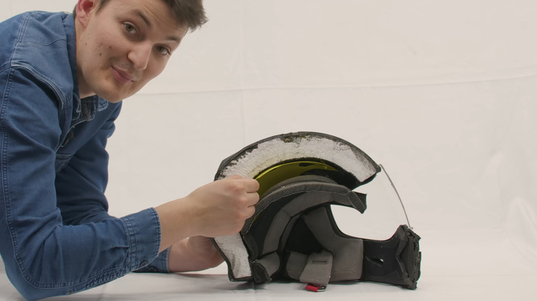A motorcycle helmet cut in half