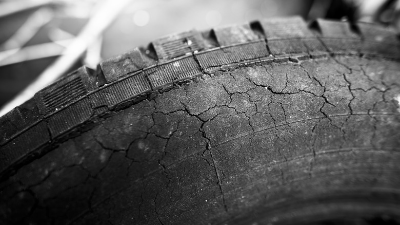 A close-up of cracks on a tire