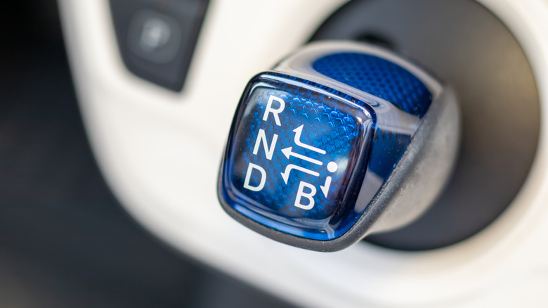 a blue gear stick belonging to a hybrid car