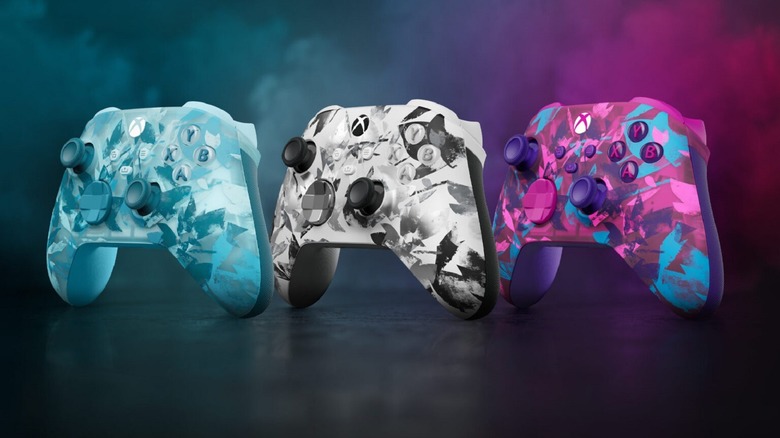 Three wireless Xbox One controllers in the special edition breaker designs.
