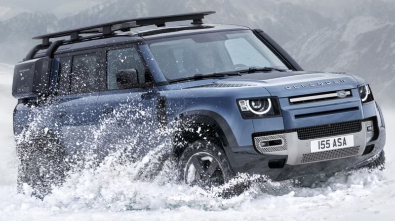 Blue Defender wading through river