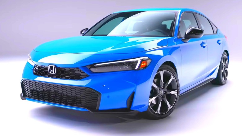 Front 3/4 view of blue 2025 Honda Civic LX sedan on white background