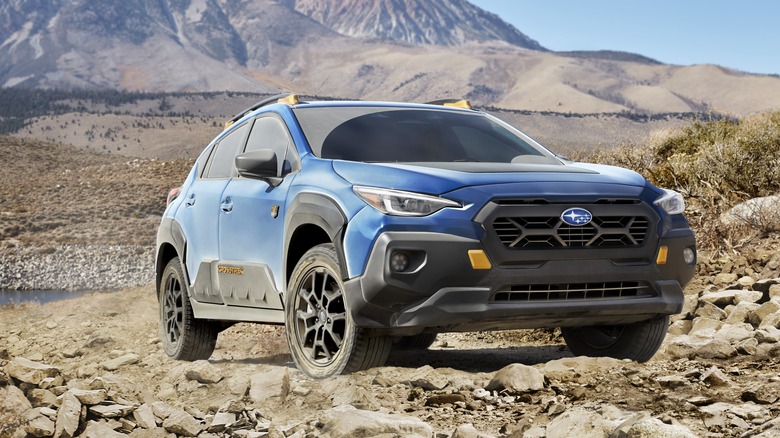 Blue 2025 Subaru Crosstrek off-roading