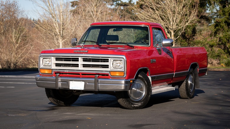 A Cummins turbo-diesel-powered Dodge Ram pickup truck in red, front 3/4 view