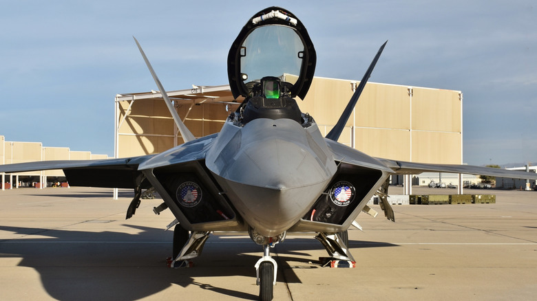 F-22 Raptor parked n front of hangar