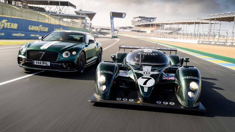 Front shot of the 2003 Bentley EXP Speed 8 next to a commemorative Continental GT