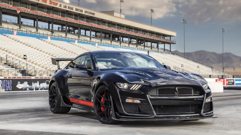 Front-quarter shot of a black and red Shelby GT500 Code Red