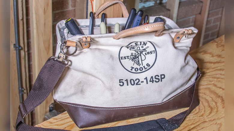 Different types of Klein Tools products in a Klein Tools canvas bag
