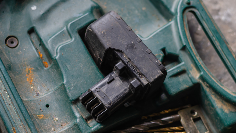 A nickel-cadmium power tool battery in a case.