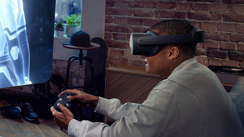 Person wearing Meta Quest 3S headset.