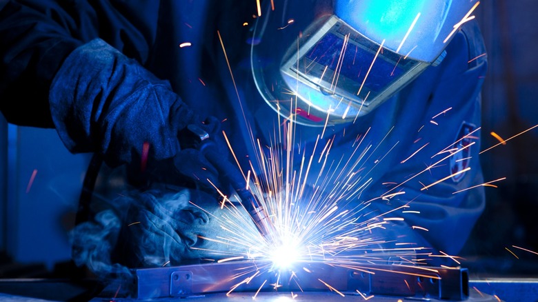 Close up of a welder, darker stylized photo