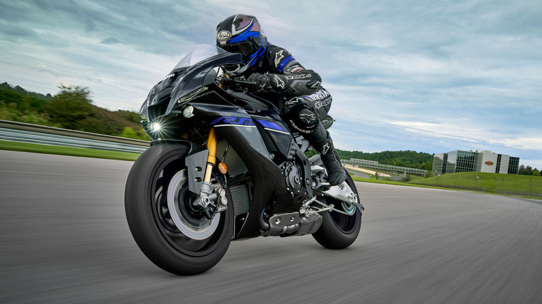 Front 3/4 view of the 2024 Yamaha R1M on a closed track