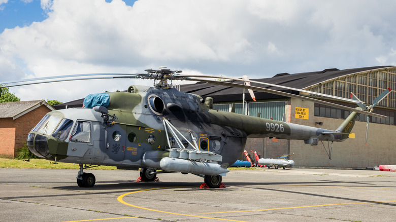 Mi-17 variant of the Mi-8 helicopter parked at a base