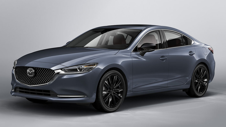 Front and side view of a blue-gray 2021 Mazda6