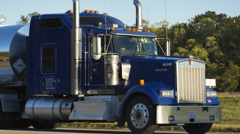 Blue colored W900 Kenworth truck