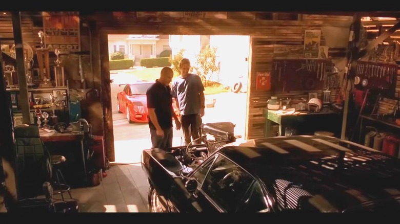 A scene from The Fast & The Furious with Chuck Taylor Racing engine