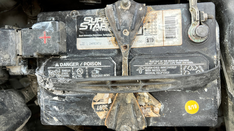 An old battery inside a car