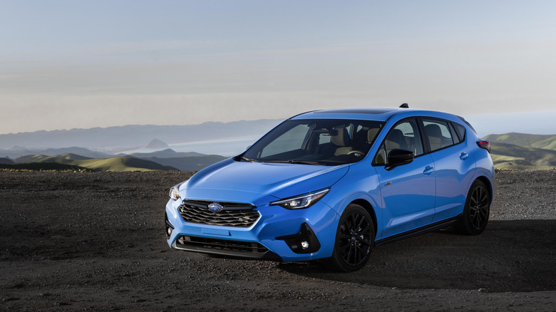 2024 Subaru Impreza RS parked on mountain
