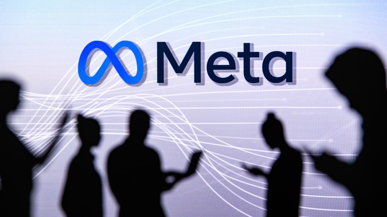 meta logo with people on devices