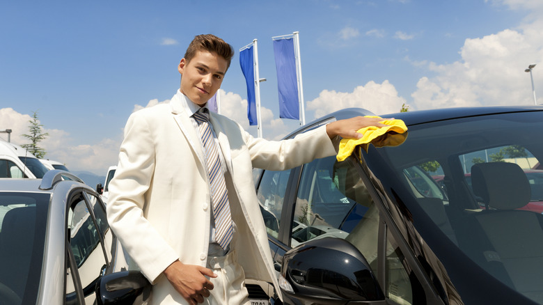 Dubious looking car salesman