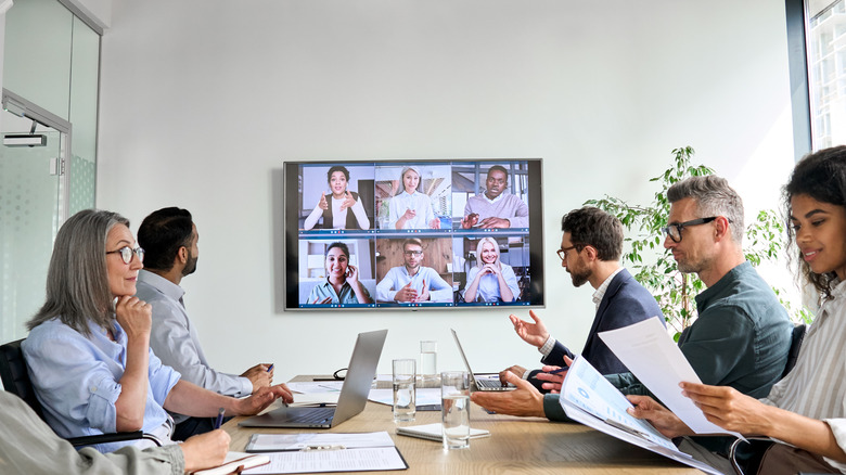 workers on a conference call