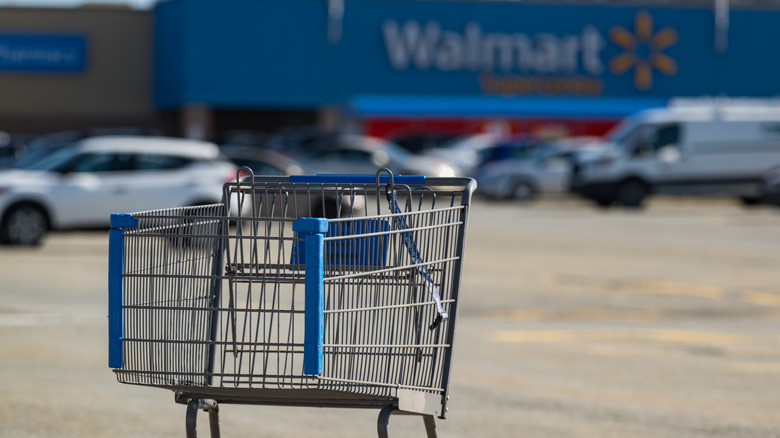 Shopping cart with a Walmart in the background