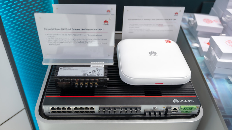Huawei branded products on display, 24-port 10G Switch, Industrial grade 5G Gateway and WiFi 7 Access Point