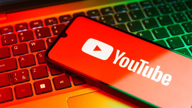 YouTube logo on a smartphone