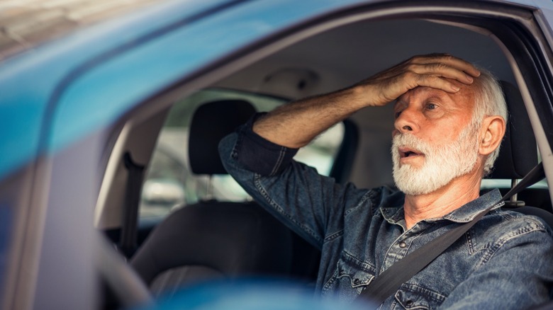 A frustrated driver experiencing a rough shifting transmission