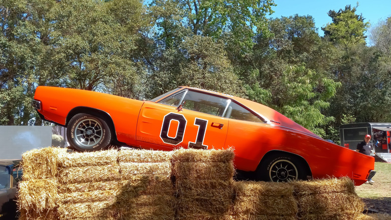 General Lee Dodge Charger from "The Dukes of Hazzard" parked atop of hay bales
