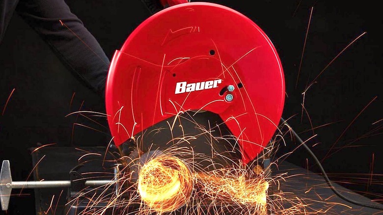 Person using Bauer chop saw