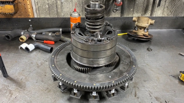 Ford Model T transmission assembly standing upright on workbench