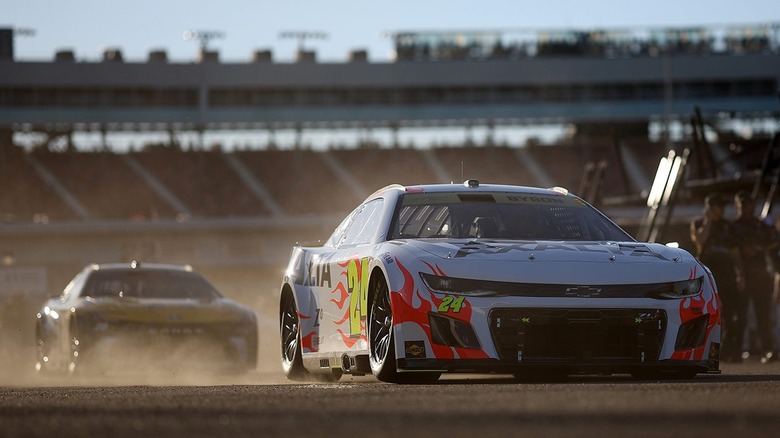 2025 Next-Generation NASCAR stock cars in pit lane, using 5-speed sequential transaxles