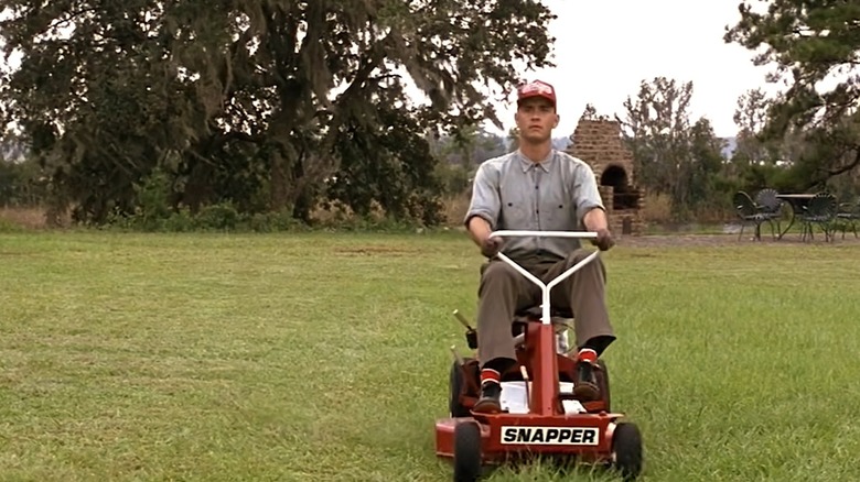 Forrest Gump mowing grass with a Snapper riding lawn mower