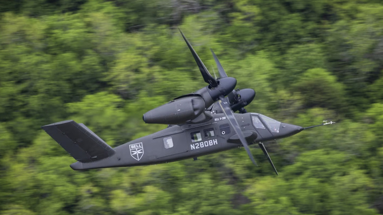 V-280 in flight over treeline