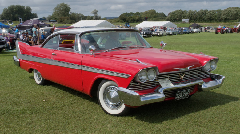 1958 Plymouth Fury parked at a car show