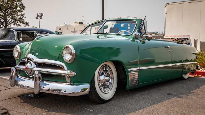 Green 1949 Ford convertible outdoors
