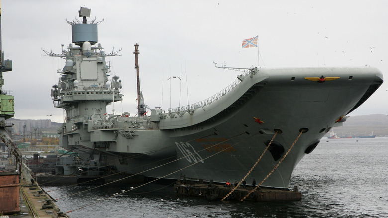 Admiral Kuznetsov at a dock
