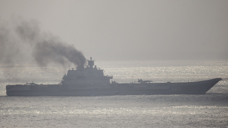 Admiral Kuznetsov sailing with black smoke coming from it