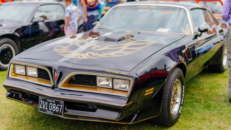 A Pontiac Trans Am Special Edition on display at a car show