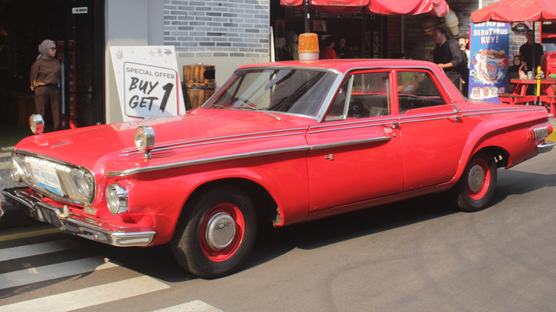 A classic Survivor Dodge Dart car or with model Dart 440
