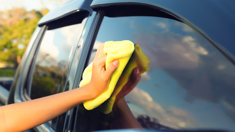 Cleaning car passenger side window