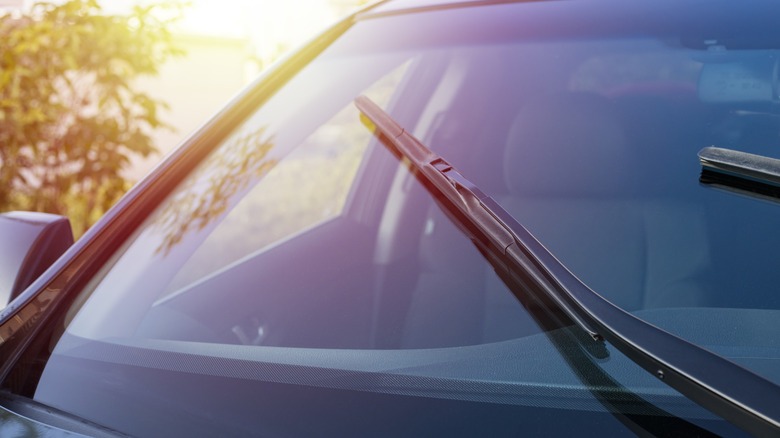Front windshield of a car at sunrise