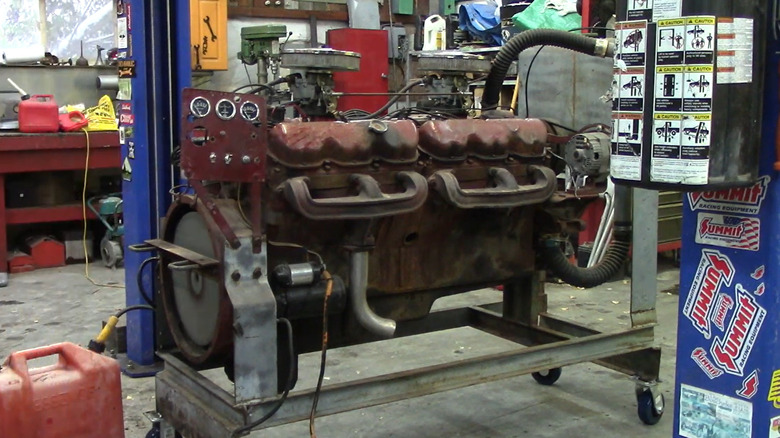 GM 702 V12 engine running on a stand