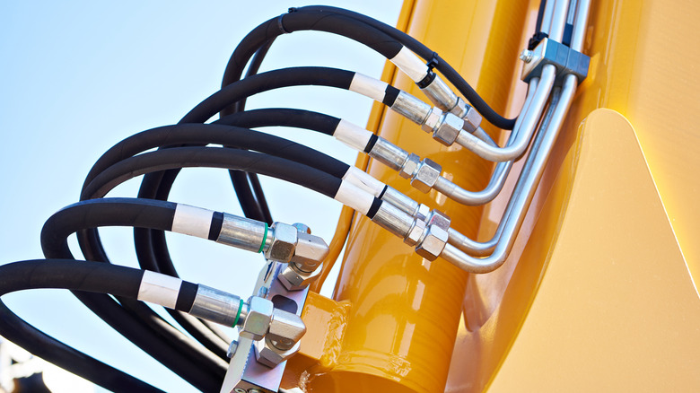 Close-up of hydraulic lines in industrial equipment