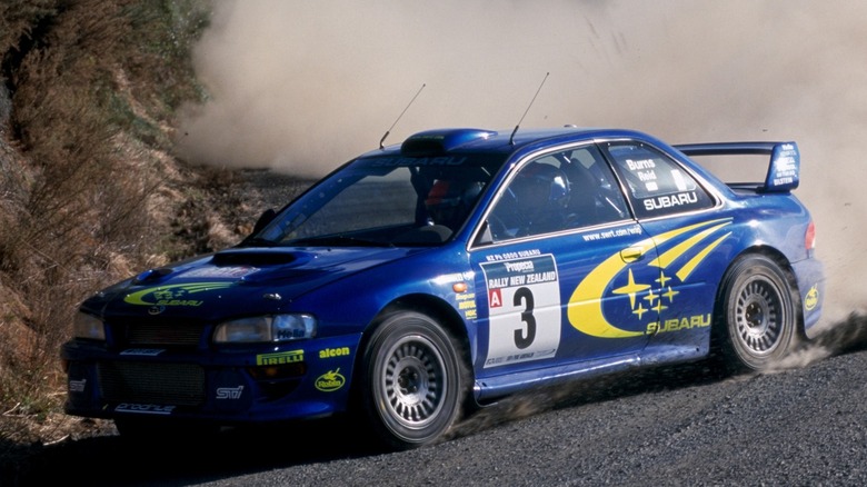 Front 3/4 view of Subaru WRX STI rally car at Rally New Zealand