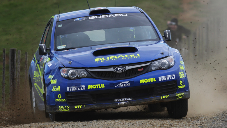 Head-on view of Subaru WRX STI on gravel rally stage
